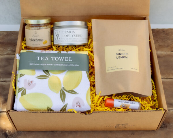 Lemon Edition Gift Box with artisan ginger lemon tea, lemon tea towel, lemon poppyseed candle, creamed honey, and natural chapstick from Lancaster County small businesses