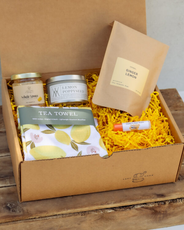 Lemon Edition Gift Box with artisan ginger lemon tea, lemon tea towel, lemon poppyseed candle, creamed honey, and natural chapstick from Lancaster County small businesses