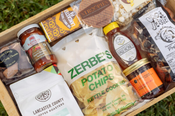 Deluxe Taste of Lancaster Edition Gift Box with coffee, potato chips, honey, jam, popcorn, pretzels, stroopie, apple butter, chocolate, and pretzel bar from Lancaster County