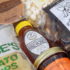 Deluxe Taste of Lancaster Edition Gift Box with coffee, potato chips, honey, jam, popcorn, pretzels, apple butter, stroopie, chocolate, and more. A generous Lancaster County gift, perfect for holidays, family gatherings, or corporate gifting.