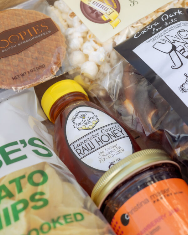 Deluxe Taste of Lancaster Edition Gift Box with coffee, potato chips, honey, jam, popcorn, pretzels, apple butter, stroopie, chocolate, and more. A generous Lancaster County gift, perfect for holidays, family gatherings, or corporate gifting.