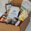 Deluxe Taste of Lancaster Gift Box featuring local Lancaster County products including coffee, pretzels, honey, popcorn, and apple butter.