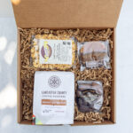 Chocolate Peanut Butter Edition Gift Box featuring local Lancaster County treats including coffee, popcorn, Stroopies, and chocolates.