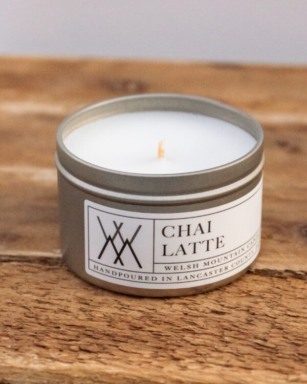 Close-up of Chai Spice creamed honey and chai candle from Lancaster County small batch makers inside gift box.