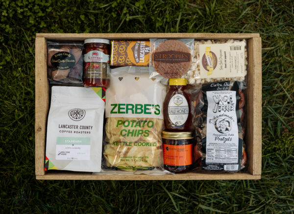Deluxe Taste of Lancaster Gift Box featuring local Lancaster County products including coffee, pretzels, honey, popcorn, and apple butter.