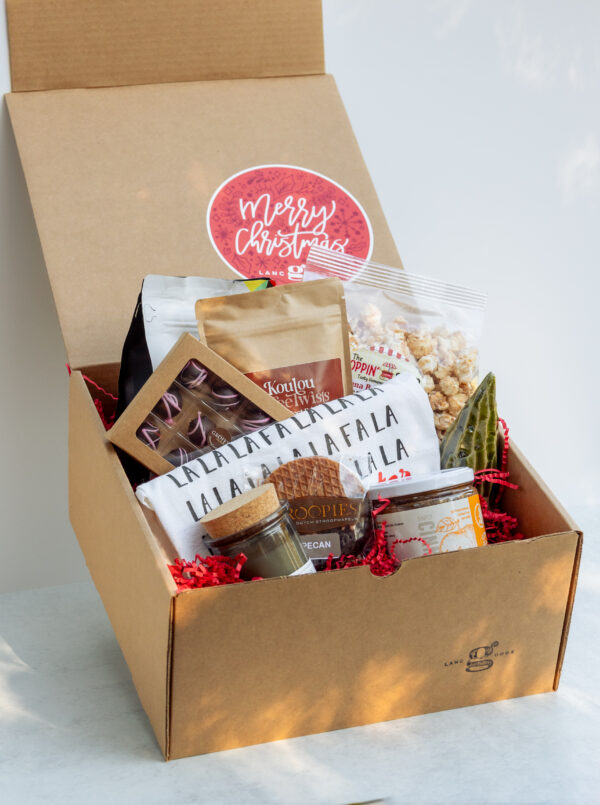 Deluxe Holiday Gift Box filled with Lancaster County products including coffee, candle, cookies, truffles, and holiday towel.