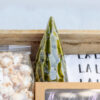 Close-up of small batch holiday products from Lancaster County inside the Deluxe Holiday Edition Gift Box.